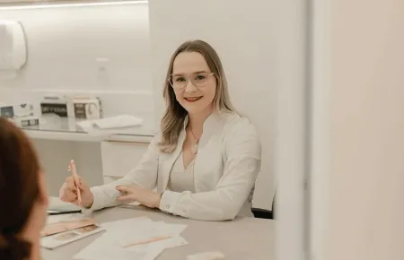 A female being interviewed in a Legal Recruitment process.