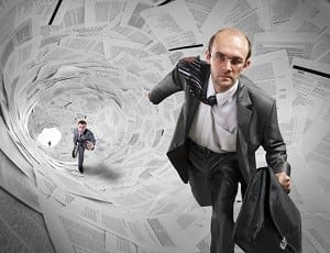 Serious businessmen running inside big documents tunnel